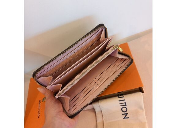 Image Portefeuille LOUIS VUITTON Zippy Toile enduite Marron