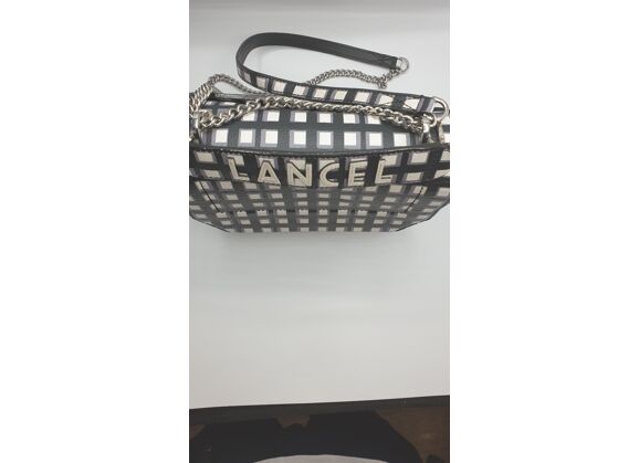 Image Sac à main LANCEL Ninon Porté croisé Cuir de vachette Noir et blanc