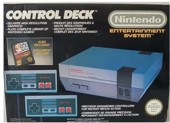 Image Console NINTENDO NES Gris + 2 manettes + Super Mario Bros
